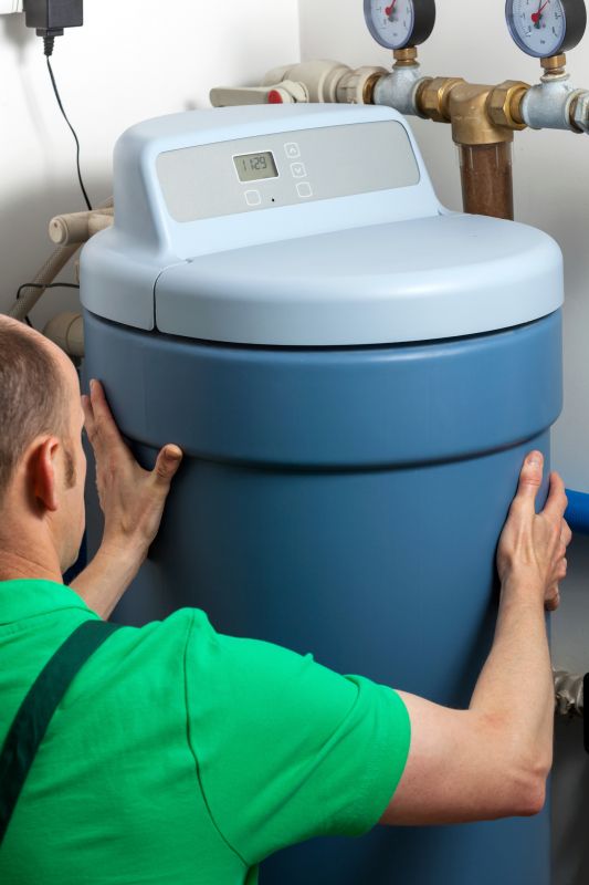Technician Installing Water Softener